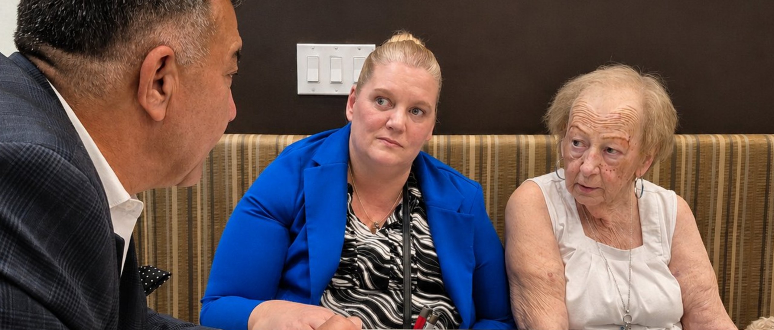 Melanie Taddeo conversing with the older adults of her community.
